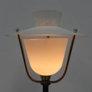 Standing vintage lamp with glass shade and perforated steel shade