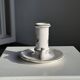 Small vintage hand-held candlestick in earthenware with green trim and floral decoration H10.5