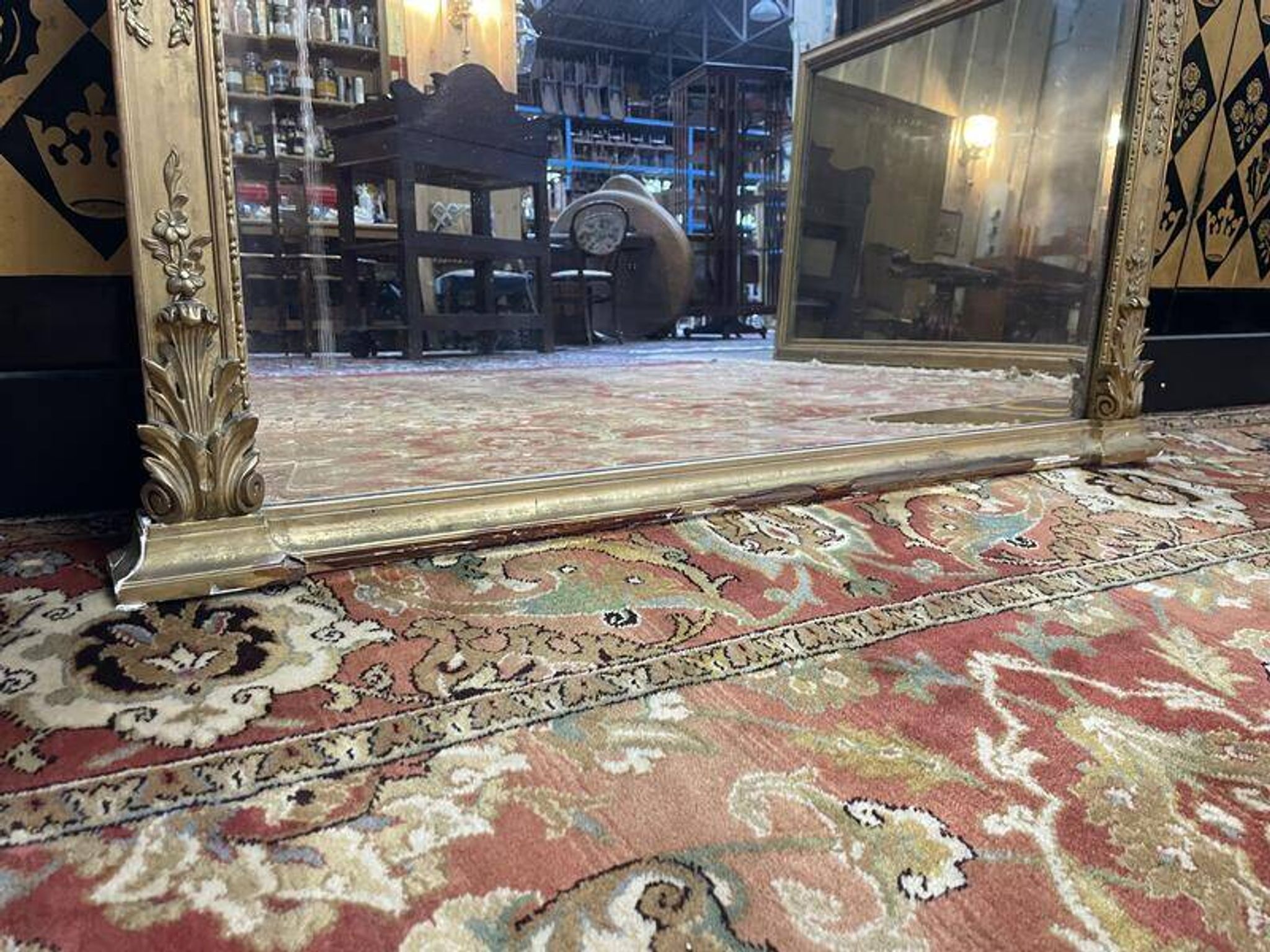 Louis XVI style mirror in gilded wood