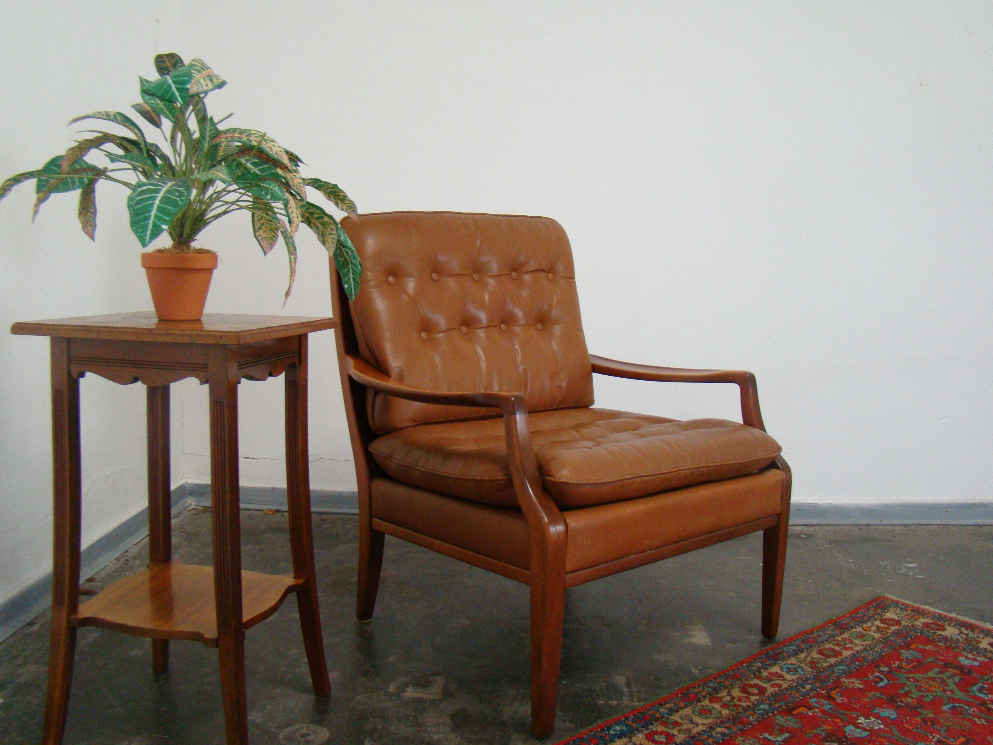 Fauteuil chesterfield en cuir vintage