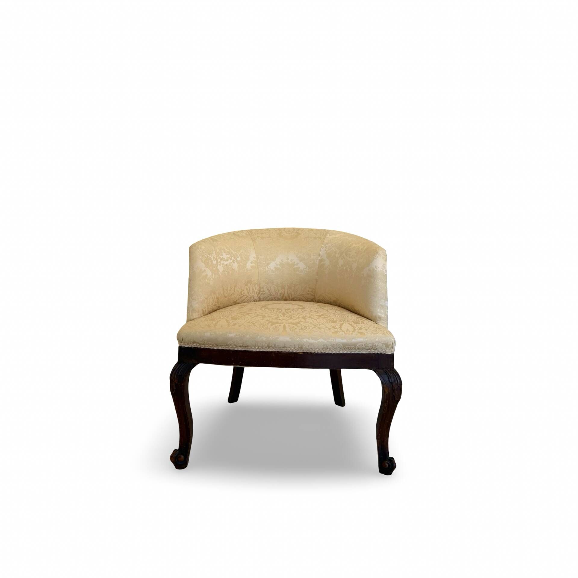 An antique Italian bar chair and a matching tufted vanity stool.