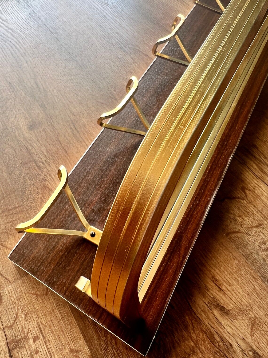 Vintage coat rack with 1970s repai décor