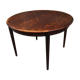 Extended rosewood round table