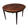 Extended rosewood round table