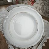 12 deep plates in porcelain with double gold trim.