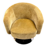 Swivel velvet armchair