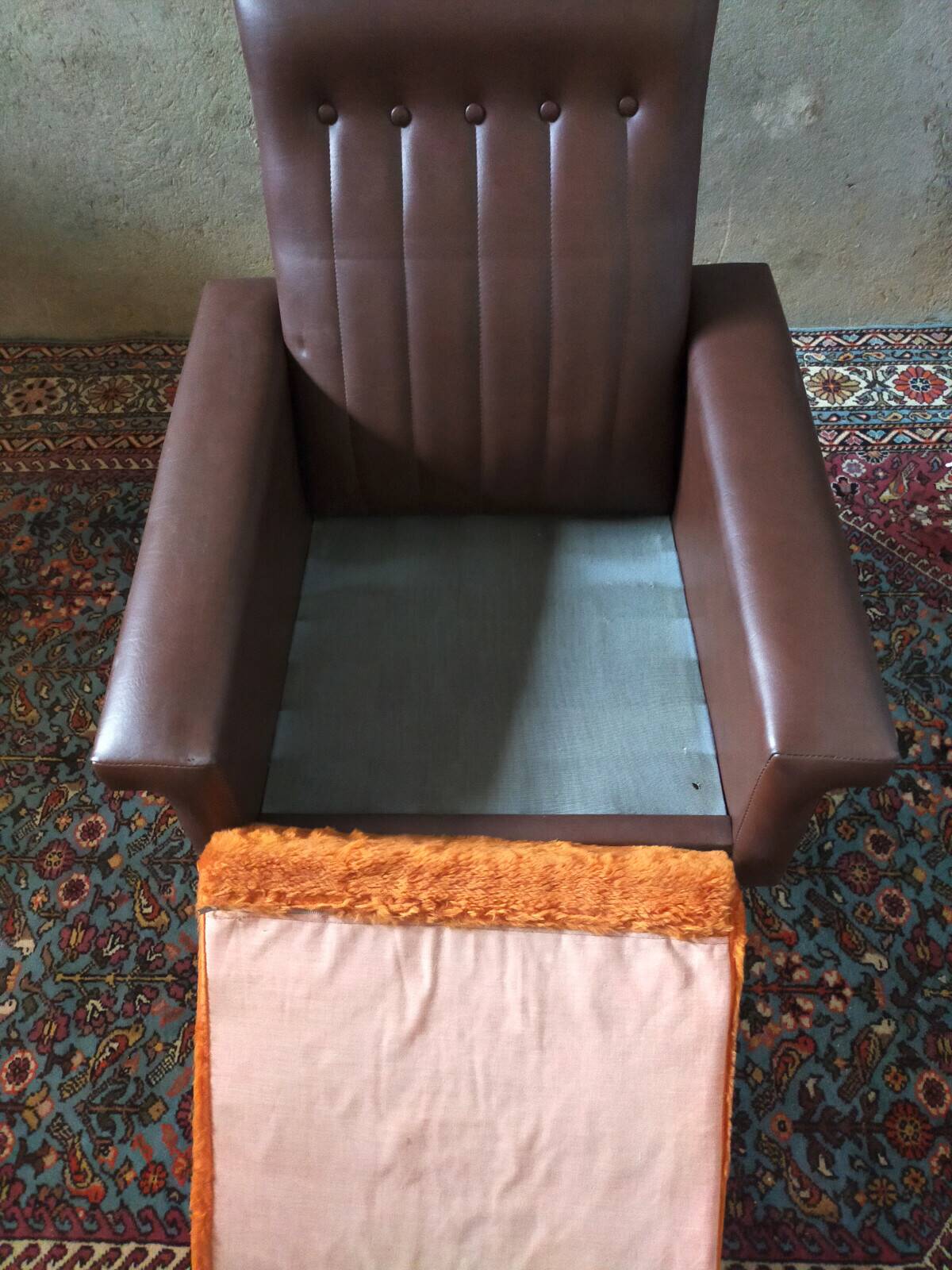 Vintage armchair in faux leather