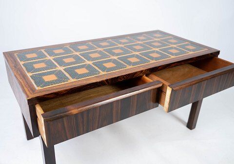 Low chest in rosewood and tiles, of danish design from the 1960s.