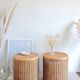 Pair of wicker bedside tables circa the 1970s.