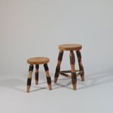 Pair of walnut stools sculpted in a vintage mid-century cross-section.