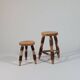 Pair of walnut stools sculpted in a vintage mid-century cross-section.