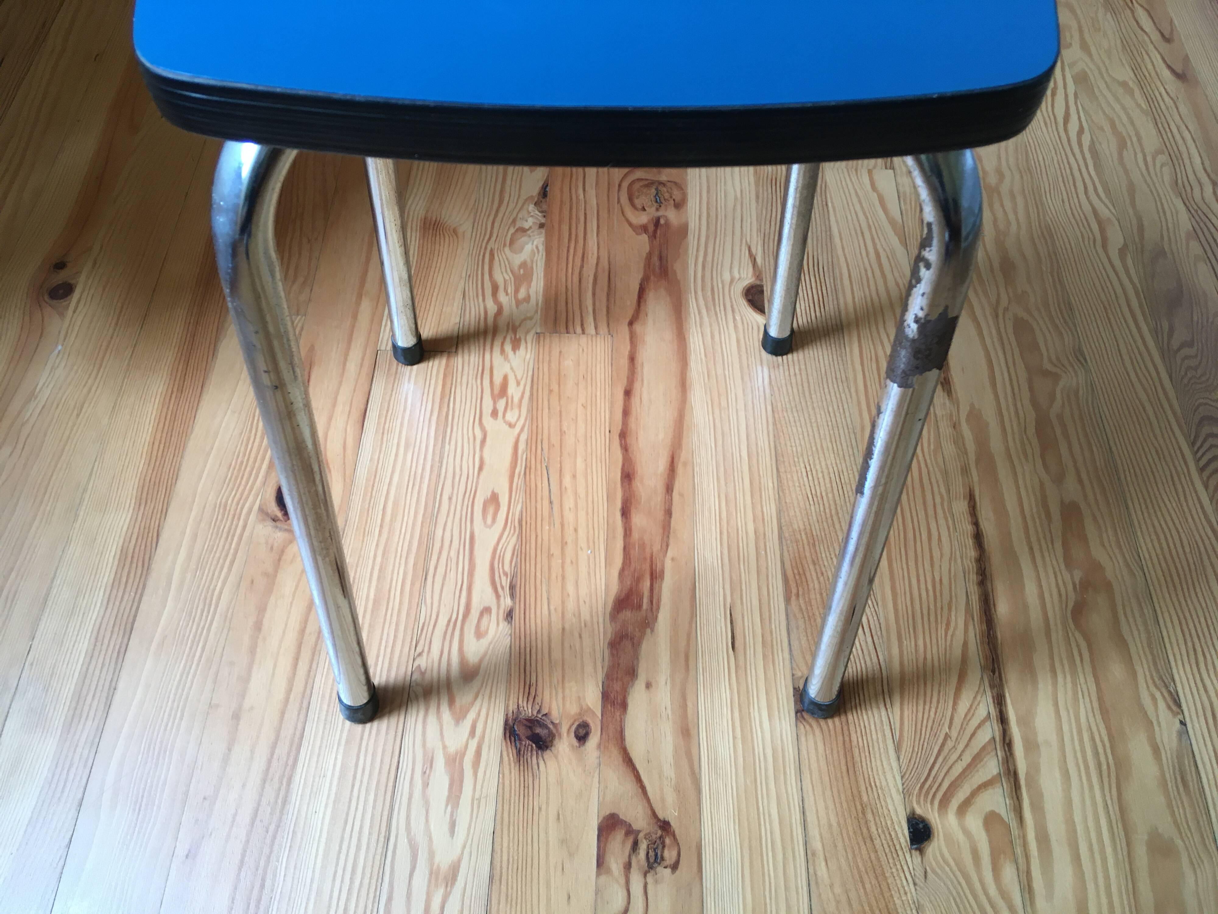 Hard blue formica stool
