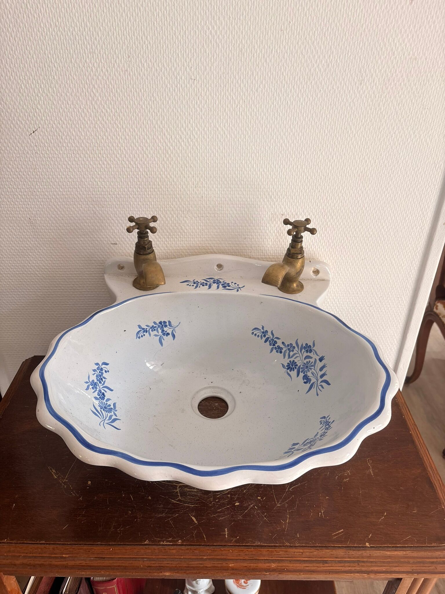 Wall-mounted washbasin shell-shaped, enamelled earthenware by Maurice Herb.