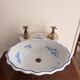 Wall-mounted washbasin shell-shaped, enamelled earthenware by Maurice Herb.