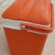 Glaciere vintage de couleur orange avec poignet  de marque EDA