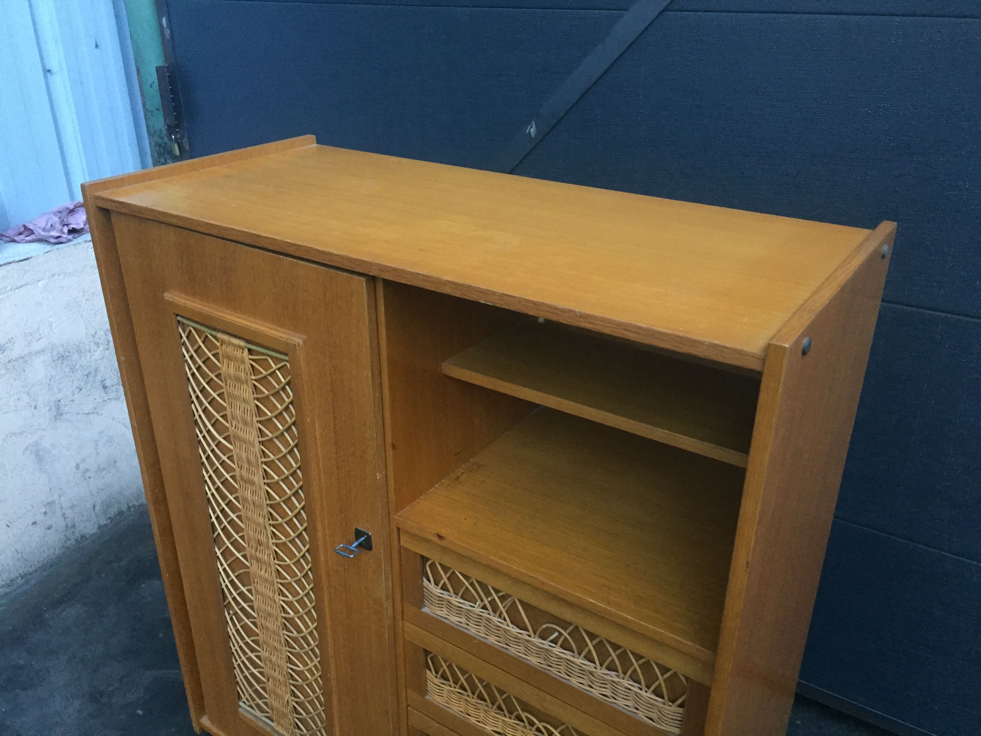 Convenient wardrobe in wood and rattan