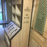 Store display for whisky and rum in metal and melamine