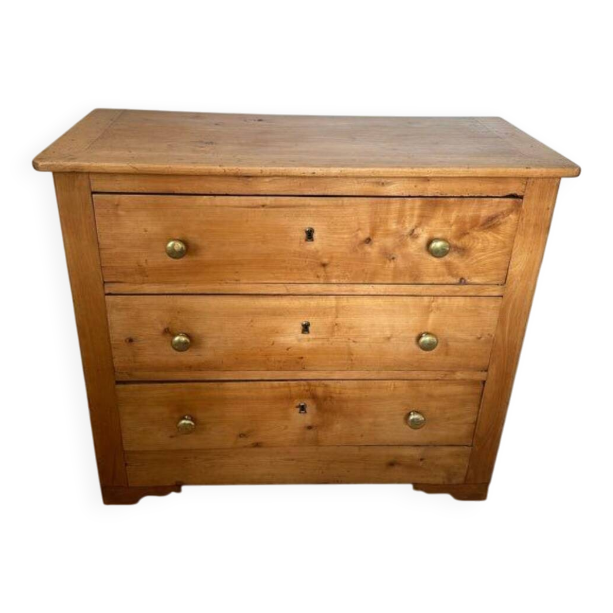 Rustic English pine chest of drawers with porcelain knobs.
