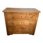 Rustic English pine chest of drawers with porcelain knobs.