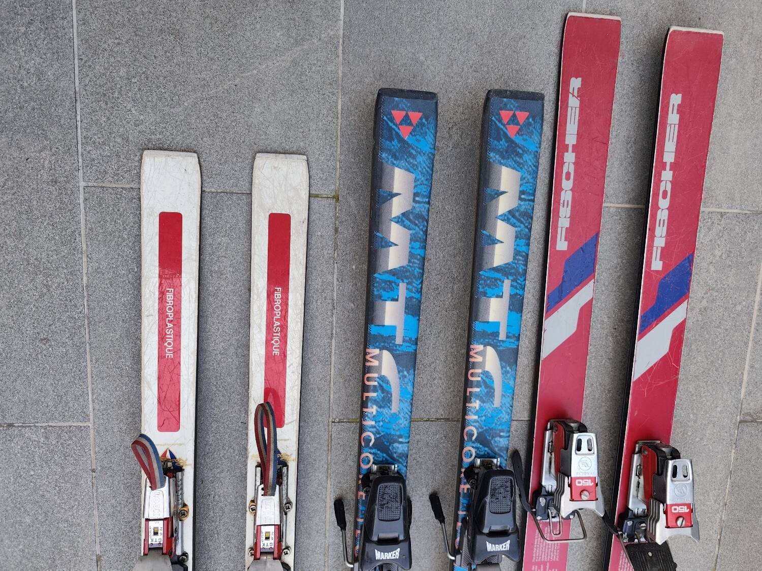 3 pairs of vintage skis: Rossignol Strato, ST 650 & Fischer.