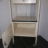 Old bedside on wheels