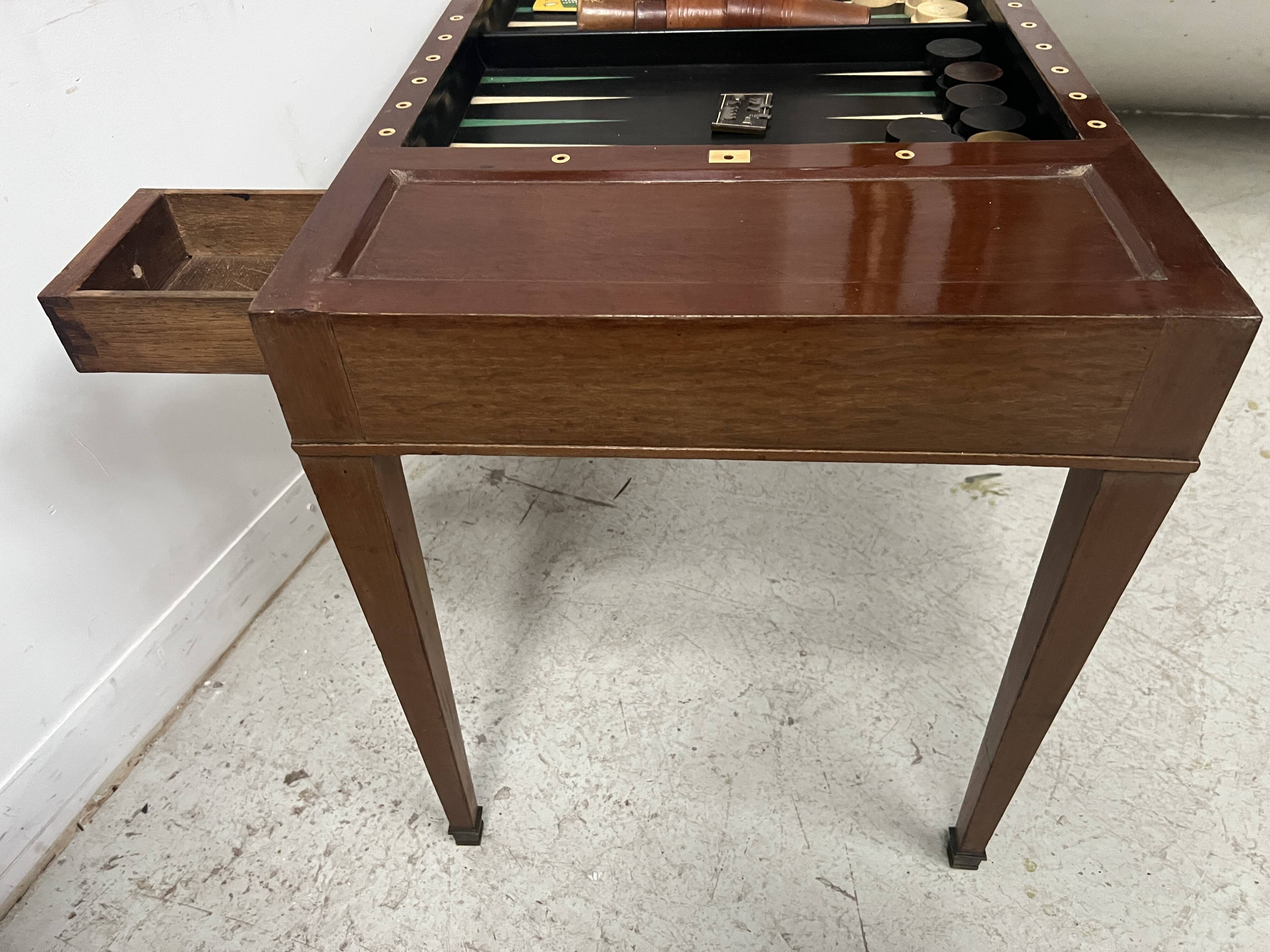Louis XVI period "Tric Trac" gaming table in 18th century mahogany.