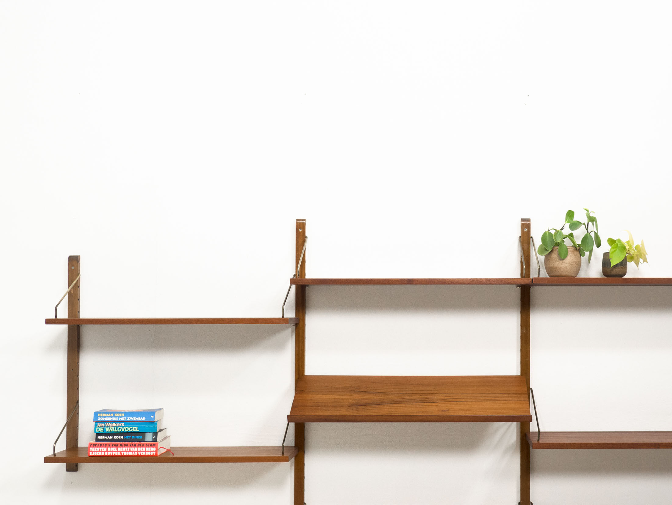 Royal System teak wall unit by Poul Cadovius