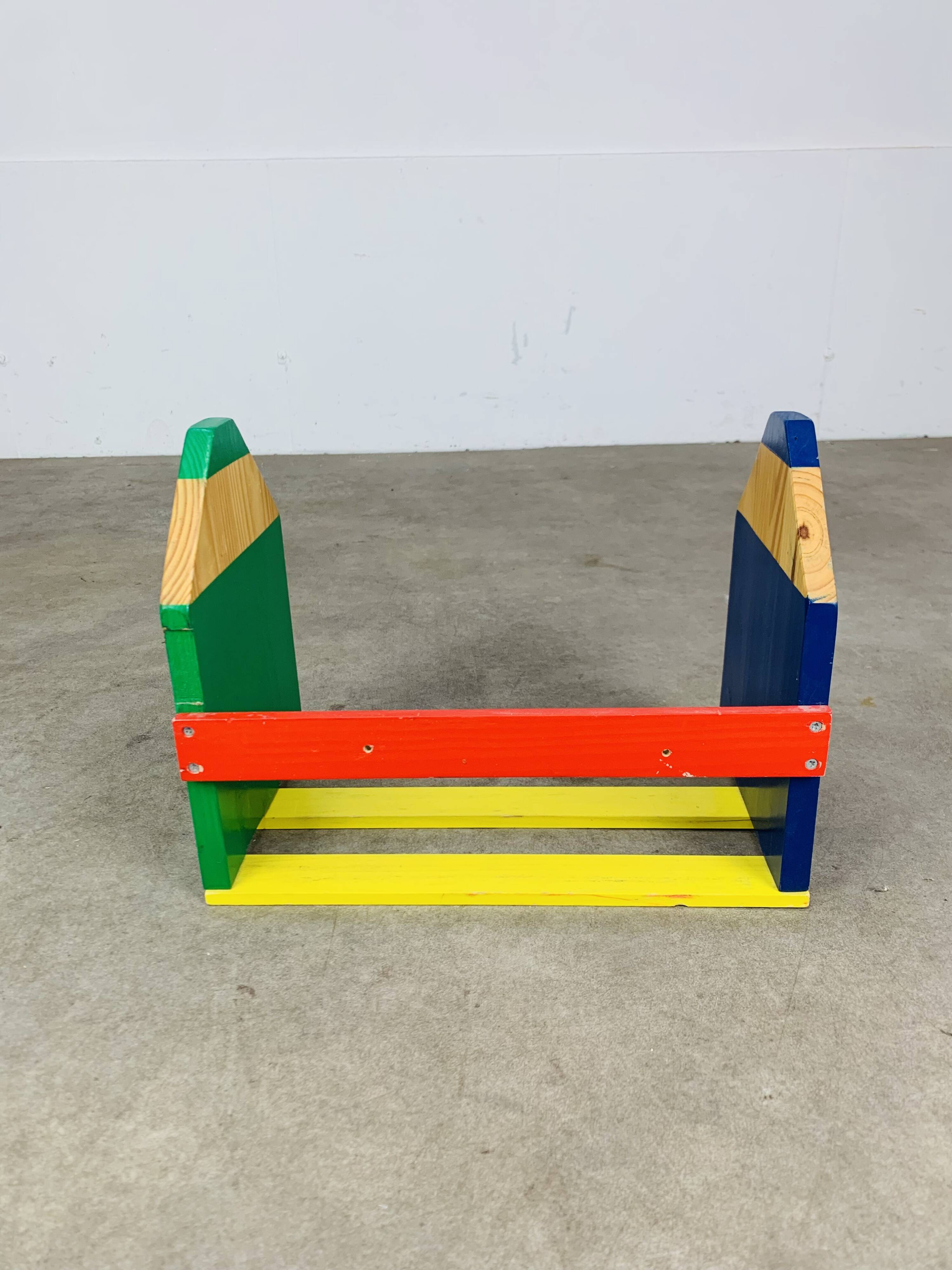 Wall-mounted pencil shelf for children, Pierre Sala style.