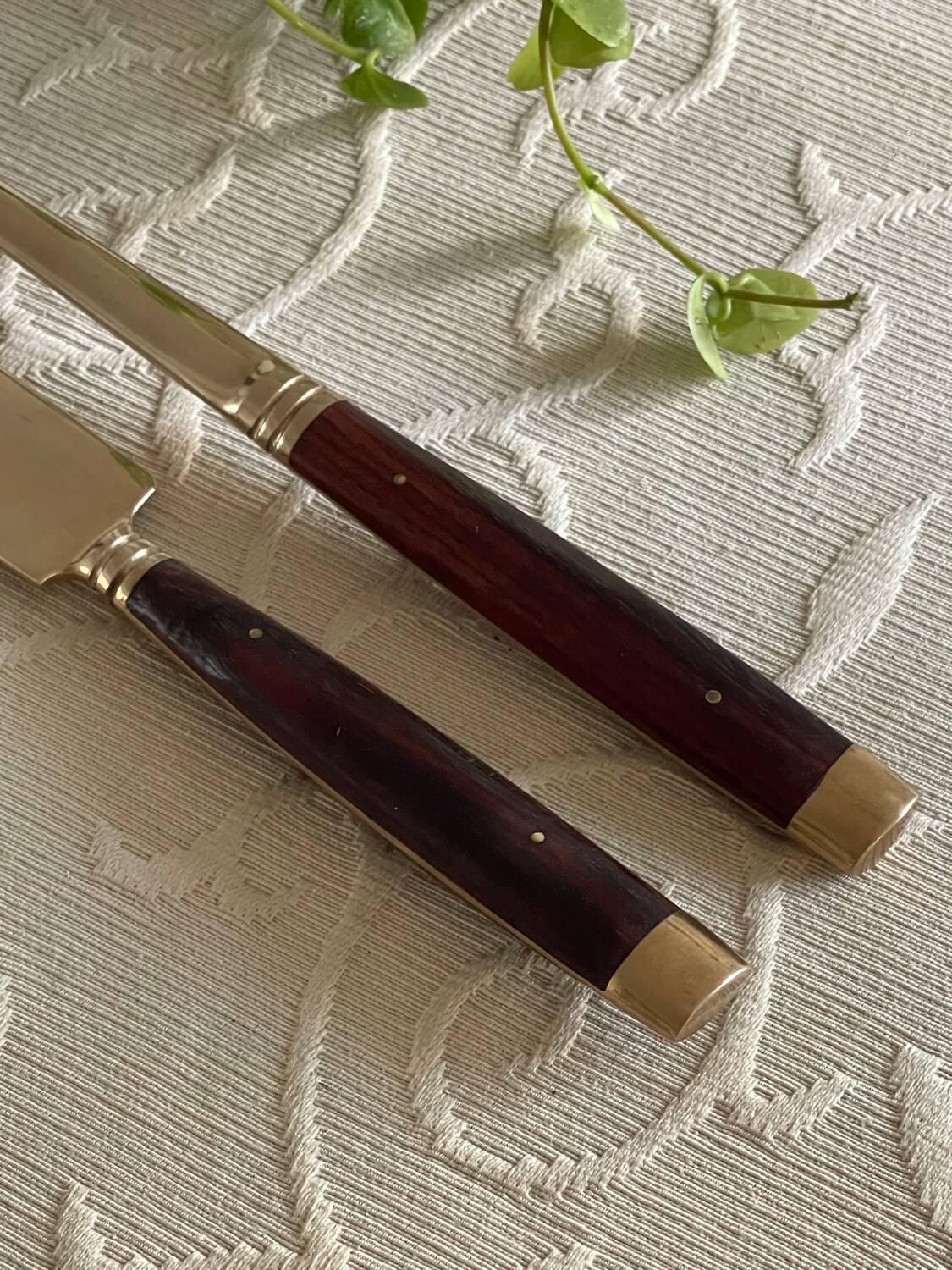 Service cutlery, brass and rosewood.