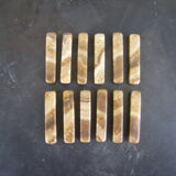 Twelve knife holders in onyx stone