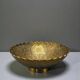 Engraved brass bowl from the mid-20th century with a scalloped edge.
