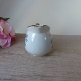 Old small artisanal milk jug in flowered speckled stoneware from the 1980s