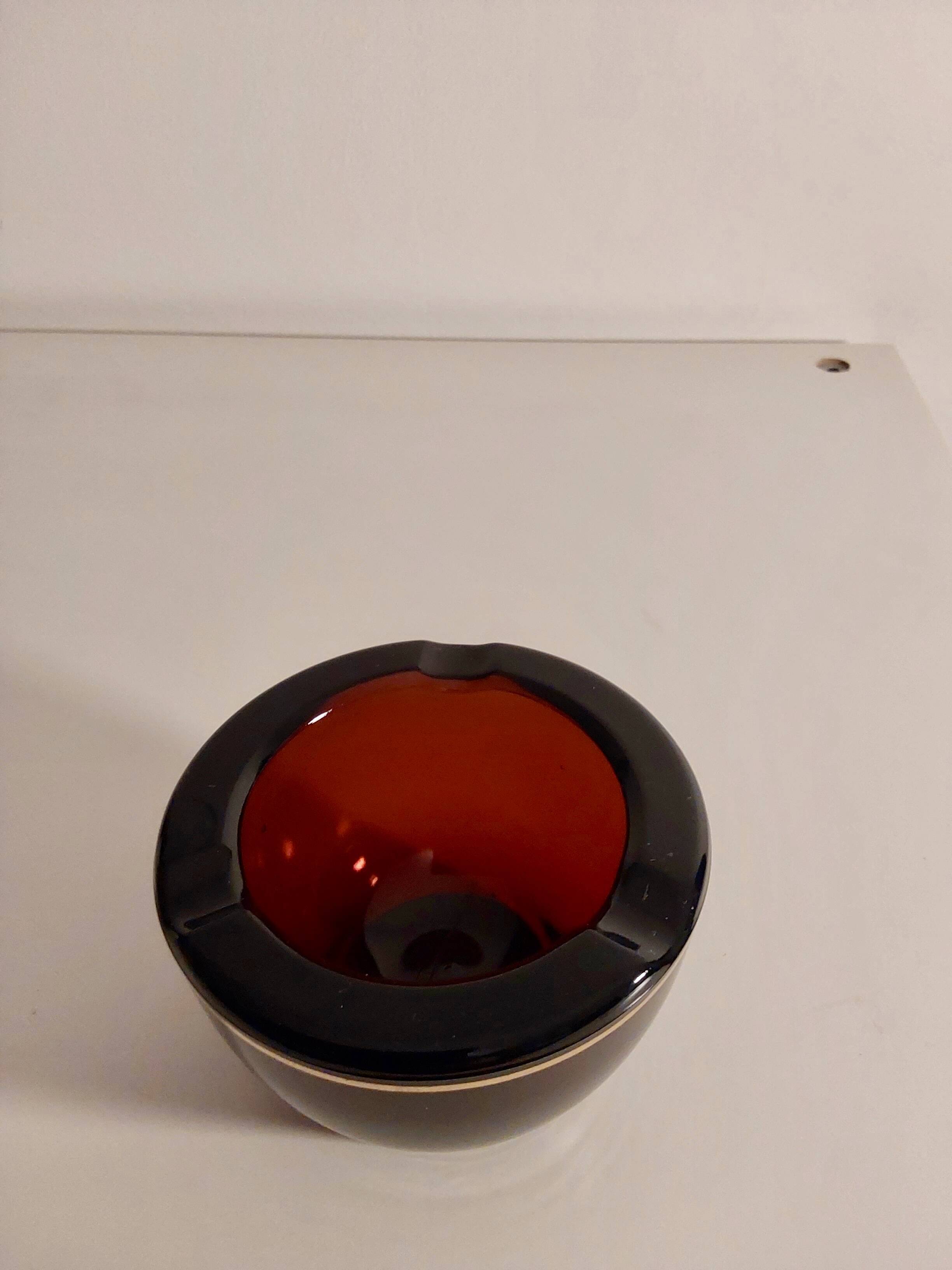 Amber glass ashtray