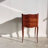 Three-drawer cherry bedside table