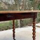 Louis Philippe oval table with shutters, 19th century, solid oak wood, twisted leg