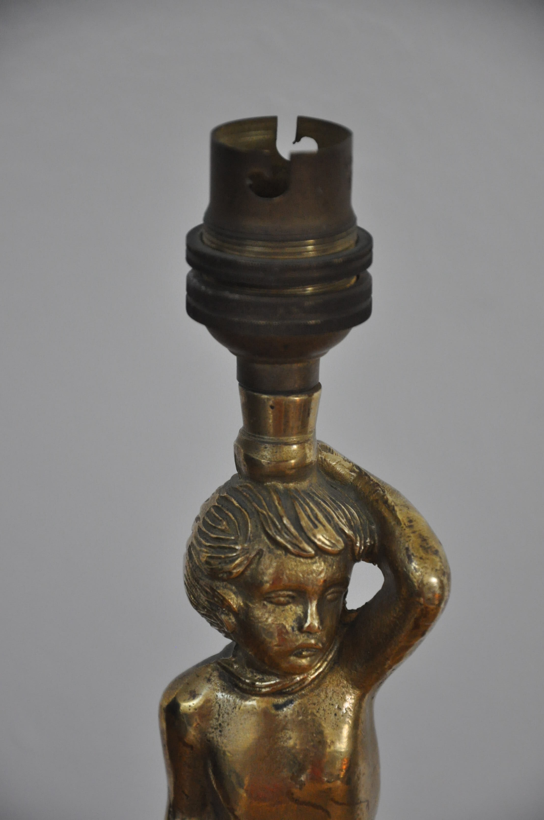Ancient alabaster lamp and bronze cherub decoration