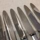 12 silver-plated dessert knives by the silversmith Ercuis, Senlis, 20.3 cm.