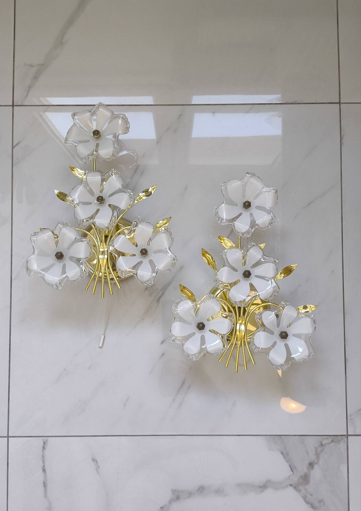 pair of floral wall lights from the 60s-70s