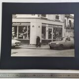 Vintage silver gelatin print of a street scene in a shop window, 1970s, framed, 52 x 42 cm