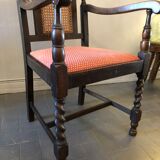 Carved wooden armchair and cannage