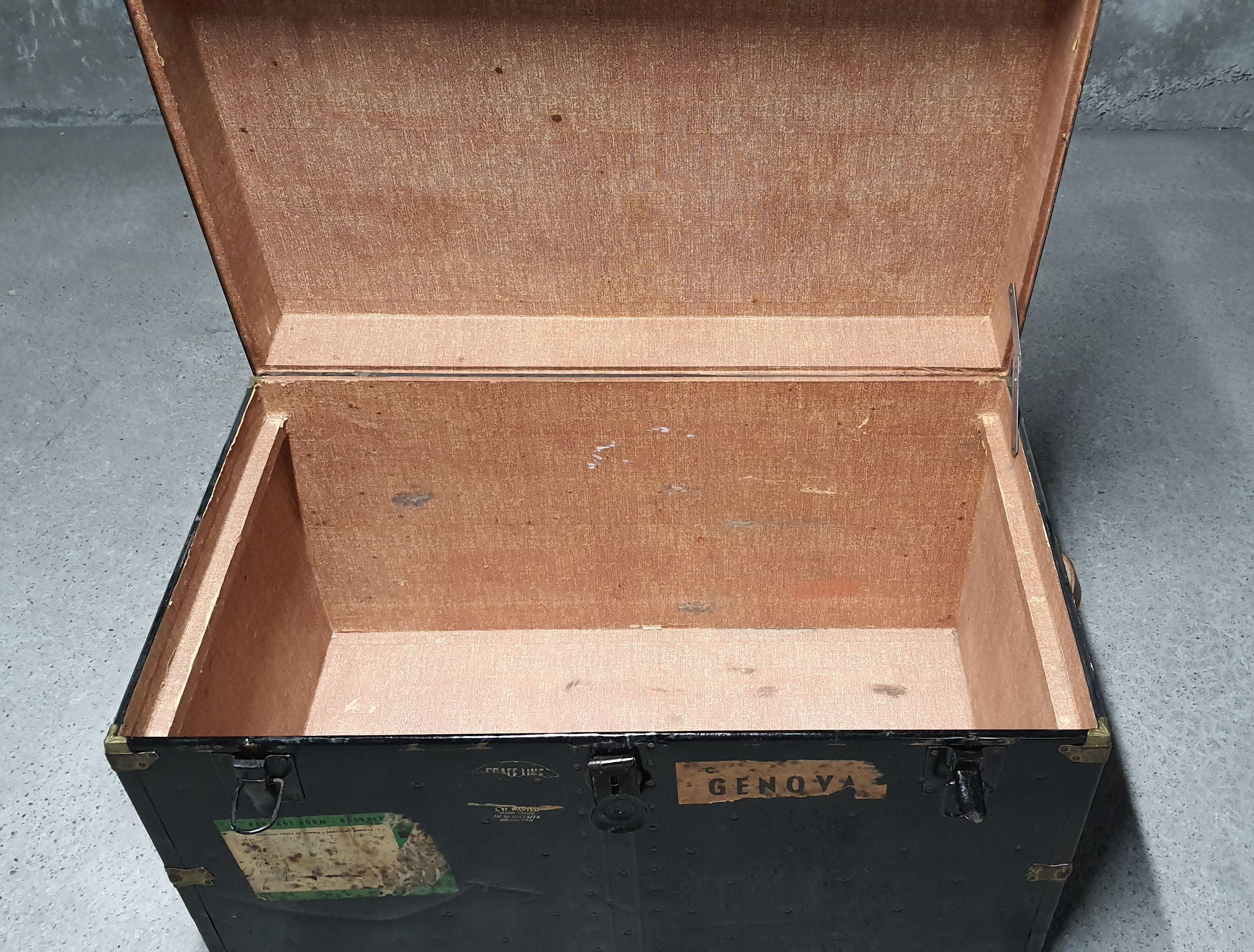 Riveted metal travel trunk