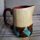Vase vintage en barbotine en forme de pichet