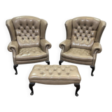Pair of high-backed Chesterfield armchairs with 1 leather footrest