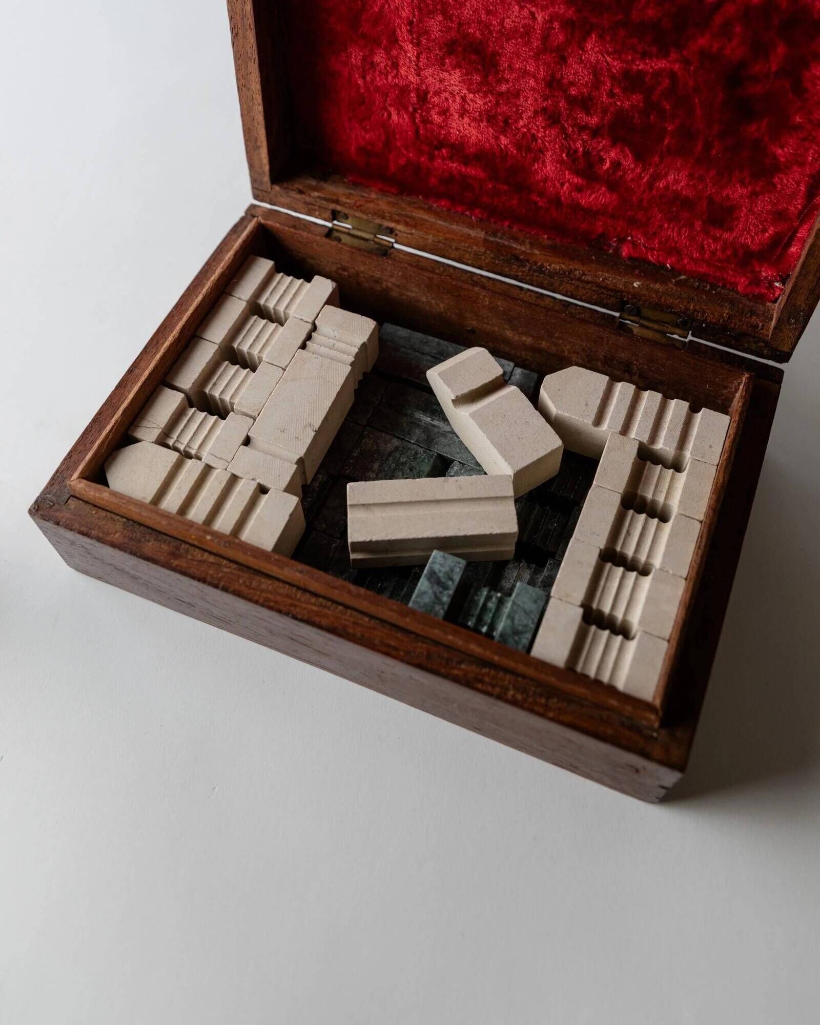 Vintage marble chess set from the 1970s, green and beige stone board, heavy design, geometric pieces, sculptural tabletop game, gift idea.