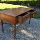Old farmhouse table louis Philippe style in solid cherry with turned feet.