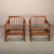 Pair Scandinavian Modern armchairs in teak and dark blue bouclé fabric