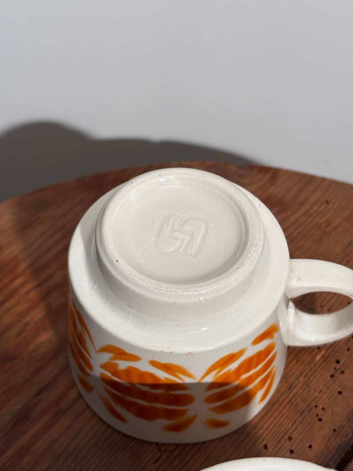 Vintage set of 4 Sarreguemines cups with orange decor