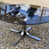 Adjustable round table in steel and glass