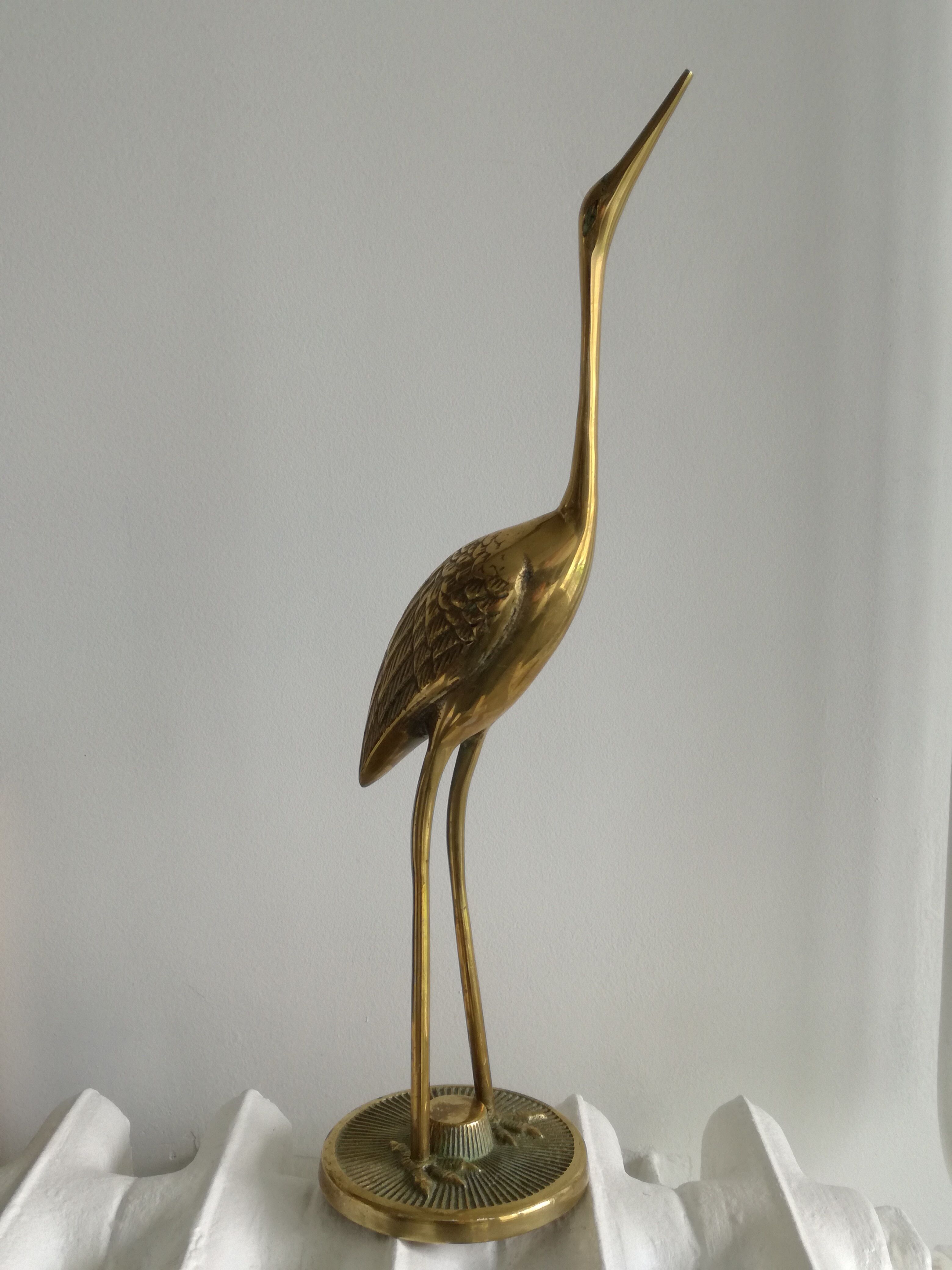 Heron vintage brass