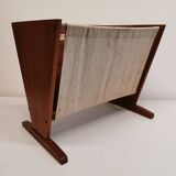 Magazine rack in teak wood with sand-coloured canvas, Danish and from the 1970s.
